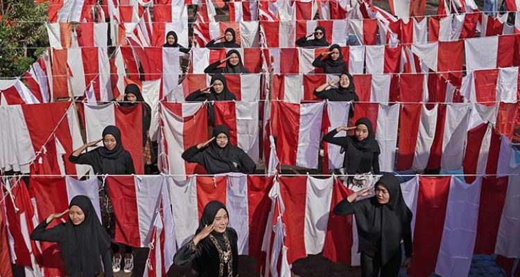 ilustrasi hormat pada bendera merah putih di momen kemerdekaan.